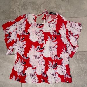 Red floral blouse